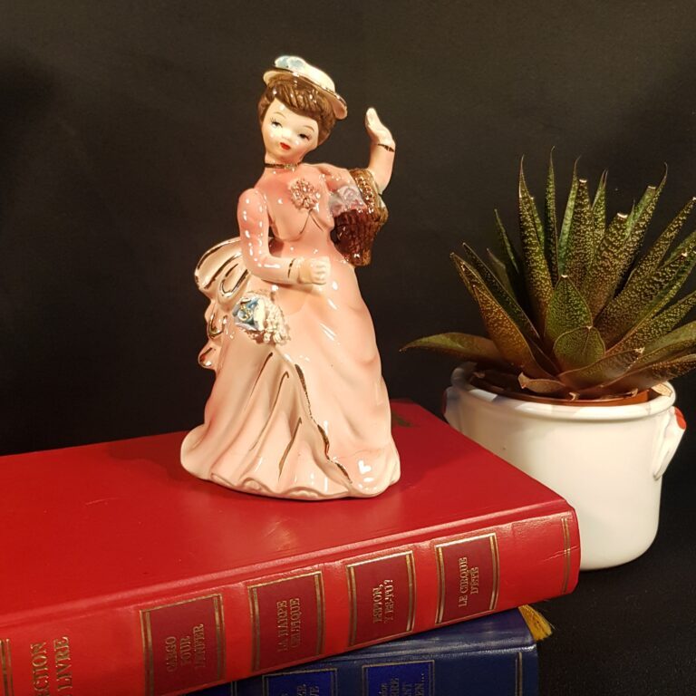 figurine porcelaine rose doree femme merveille et bout de chandelle