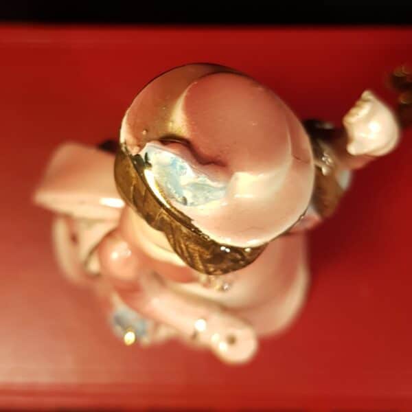 figurine porcelaine rose doree merveille et bout de chandelle 9